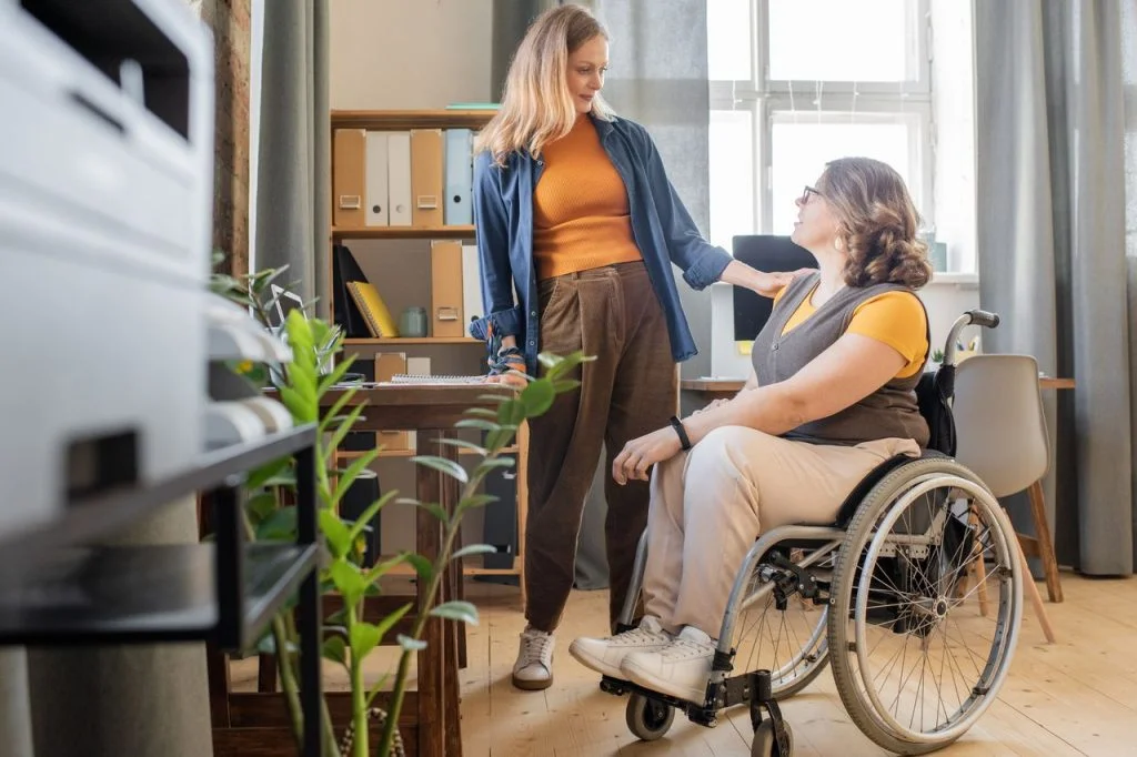 Support-coordinator-helping-a-client-illustrating-the-rewarding-career-path-as-part-of-the-NDIS
